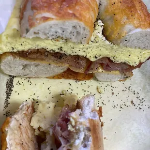 Bacon, egg and cheese on a jalapeño bagel with a potato knish on the side. Just added pepper.