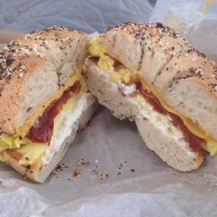 Bacon, egg, cheese and cream cheese on an everything bagel