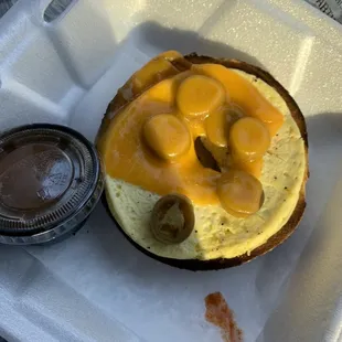This is a breakfast egg and cheese bagel with jalapeños they gave me