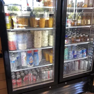 Drinks &amp; cream cheese to buy in fridge.