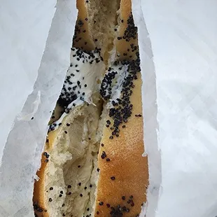 Poppyseed bagel with cream cheese