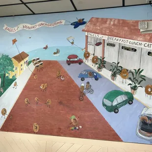 a mural of a town