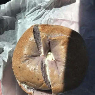 Blueberry bagel with cream cheese.