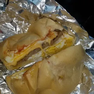 Sausage, egg (over easy), cheese, ketchup, pepper on a scooped and toasted (even though it was barley toasted) "kaiser roll"