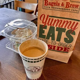 a cup of coffee and a bagel