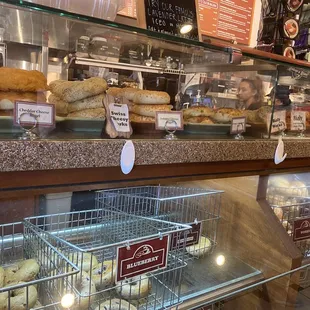 a display of bagels and coffee