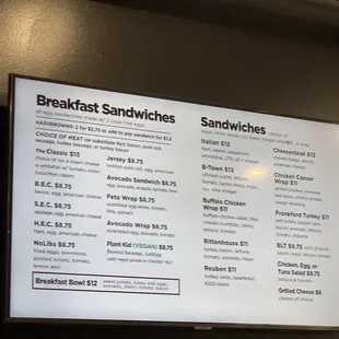 a menu for breakfast sandwiches