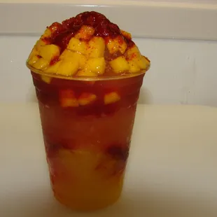 Chamango. Shaved ice, Mango and Chamoy, lemon and and garnish with chili salt.