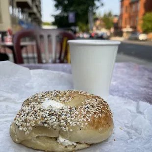 a bagel and a cup of coffee