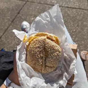 sausage, egg, and cheese on a sesame bagel