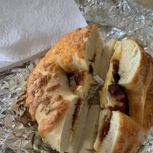 Bacon egg and cheese on a cheddar  bagel