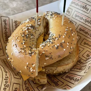  bagel sandwich with a bite taken out of it