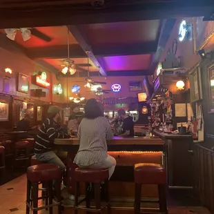 a man sitting at a bar