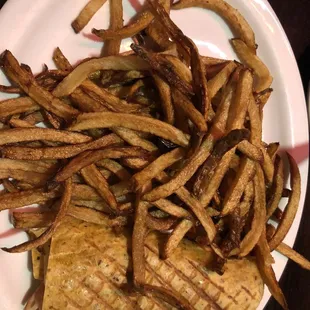 Turkey club wrap with a side of fries