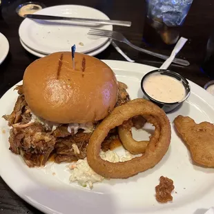 Pulled pork with coleslaw and onion rings(ate some of the onion rings). Very tasty!