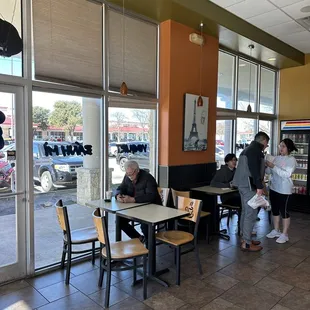 a group of people in a restaurant