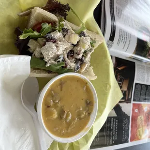 a bowl of soup and a sandwich