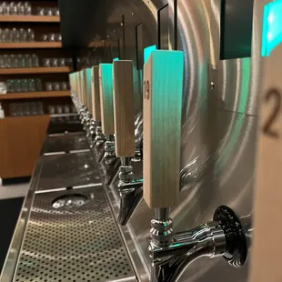 Self pour beer wall!  Buy by the ounce so much fun to do tasters