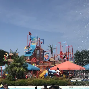 The area for kids, that bucket fills then turns over &amp; splashes on everyone waiting below