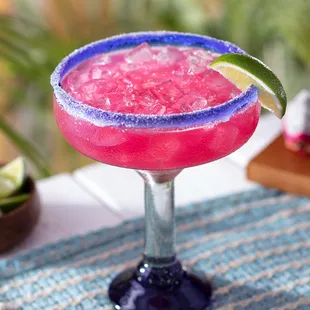 Dragon Fruit Margarita - Patrón Silver Tequila, triple sec, dragon fruit, key lime juice, sweet &amp; sour with a sugar rim.