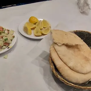 Tahini sauce, lemons, pjta bread...