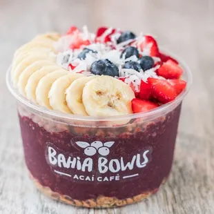 a smoothie with bananas, strawberries, and blueberries