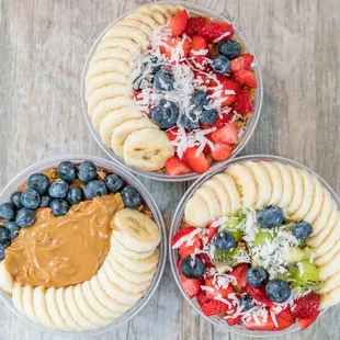 three bowls of fruit and nut butter