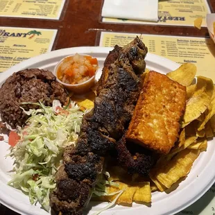 Carne Asada with plantains, queso frito, gallo pinto and a type of curtido=All u need!!!!