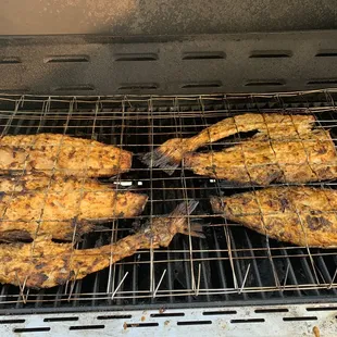 Grilled Robalo fish. Zarandeado.