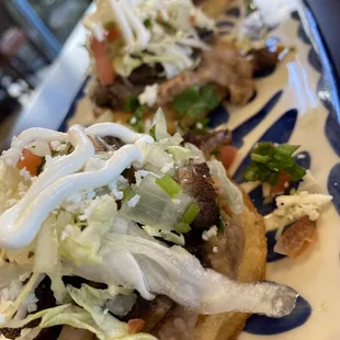 a plate of tacos