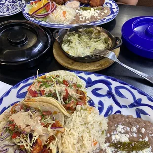 Queso fundido and shrimp tacos with diabla sauce