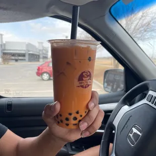 Shaken Thai tea with boba - my boyfriend&apos;s first boba tea. He loves it