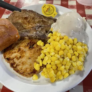 Grilled Pork Chops, Mashed Potato&apos;s and gravy, Corn