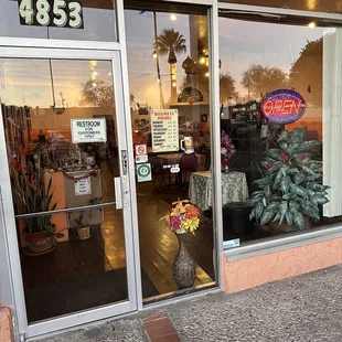 a storefront with a large glass door