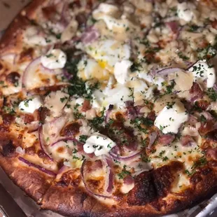a close up of a pizza