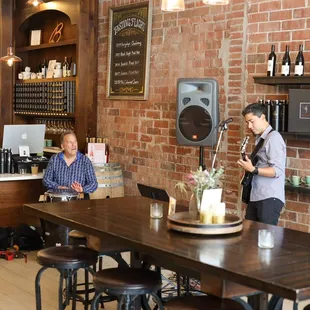two men sitting at a table