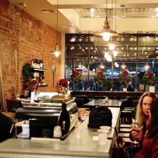 a woman sitting at the bar