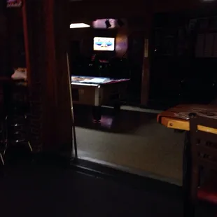 a pool table and a television