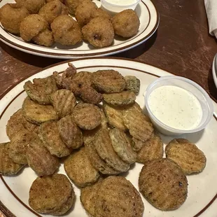 Fried appetizers with maybe fried fish or chicken pieces mixed in.