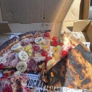 Burnt Hawaiian pizza.
