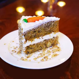 Moist, spiced, and loaded with fresh carrots and walnuts, topped with creamy frosting.