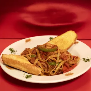 A flavorful mix of tender shrimp, sausage, and chicken, simmered in a zesty Creole sauce with rice.