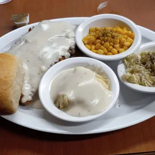 Chicken Fried Steak, roll, and two vegetables. Ordered an additional vegetable.