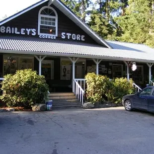 a car parked in front of the store