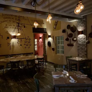 a dining area with tables and chairs