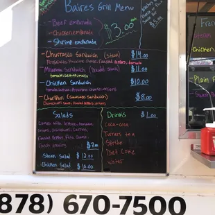 a menu on the side of the truck