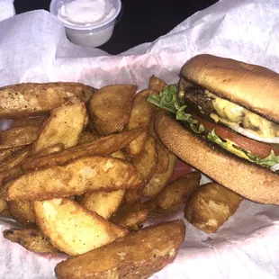My small cheeseburger and potato wedges. Super tasty