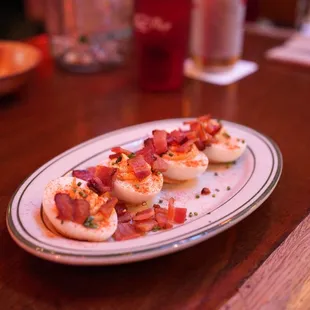 Deviled eggs with bacon.