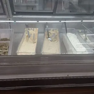 Appetizers such as hummus and garlic sauce.