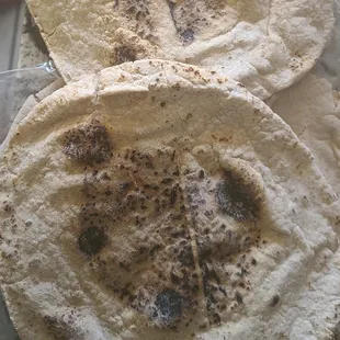 two flour tortillas on a table